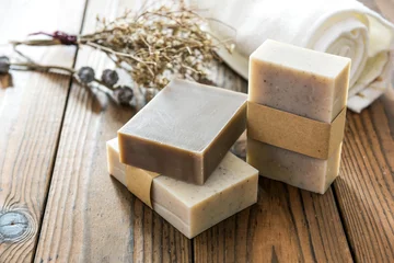 Handmade natural soap on wooden background © ddukang