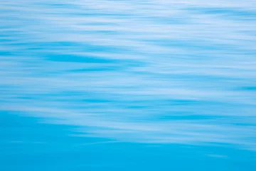 Foto auf Leinwand Синие морские волны солнечный свет © natatretiakova