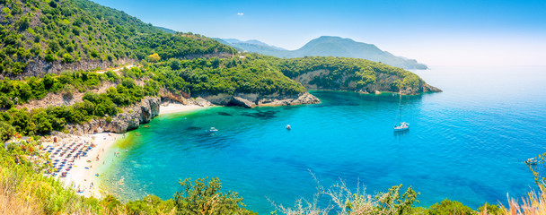 Naklejka premium beach in a cozy bay on the Amalfitan coast of Italy, Campania, Italy