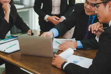 Managers and employees Talking about work in the workplace