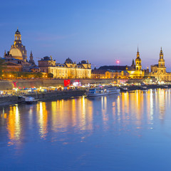 Obraz premium golden lights of night Dresden in Germany in blue evening