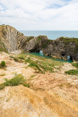 Limestone Foldings on Stair Hole Chalk Cliffs and Atlantic Ocean.