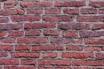 Old brick wall, background of bricks, cement masonry, blank for designer, pattern in vintage style