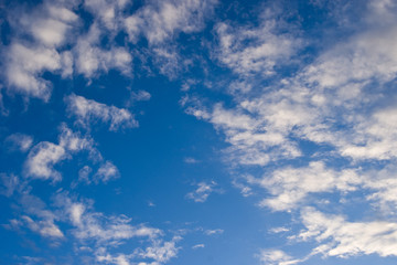 Blue sky with few white clouds