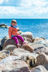 Fototapeta na wymiar girl on the rocks