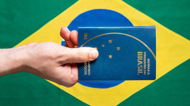 Brazilian Passport on Brazilian flag background - republica federativa do Brasil, mercosul