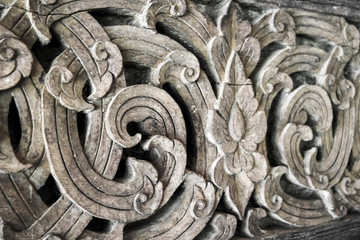 Thai art carving on plank wood