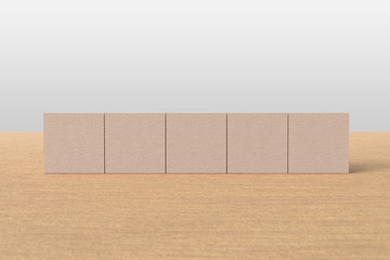 Empty wood cubes in a row on a table