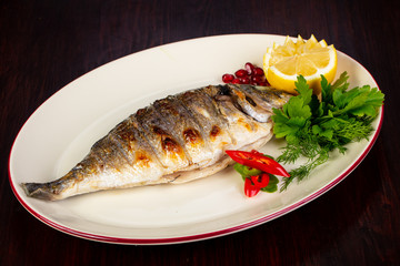 Grilled dorada served lemon