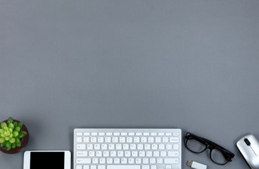 Gray desktop with bottom border at work technology