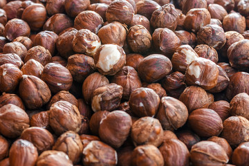 Nut background of hazelnut fruits. Food background. Top view of hazelnut nuts.