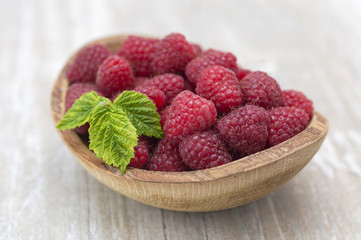 garden raspberry on a kitchen table. 