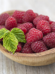 garden raspberry on a kitchen table. 