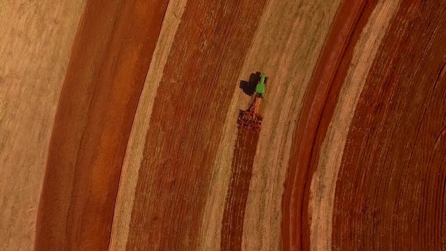 Tractor working with implement