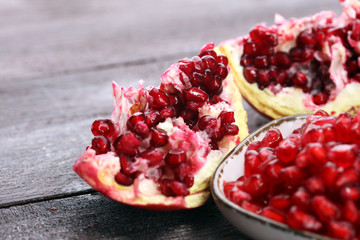 Ripe and juicy pomegranate. Red organic pomegranate.