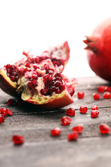 Ripe and juicy pomegranate. Red organic pomegranate.