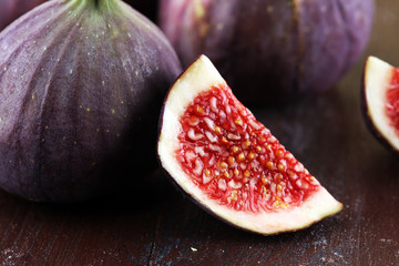 Fresh figs. Food Photo. whole and sliced figs on rustic background.
