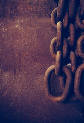 Hanging rusty chains