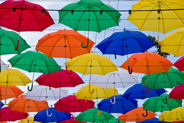 Fototapeta na wymiar Flying umbrellas
