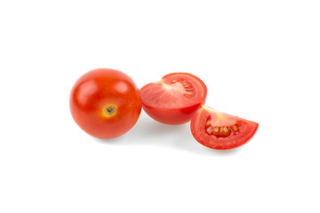 a tomato is cut into pieces on a white background