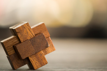 wooden game block abstract with bokeh