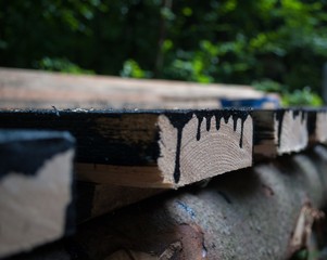 boards covered with dark paint