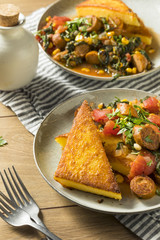 Fried Polenta with Sausage Stew
