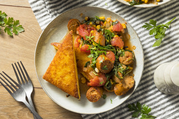 Fried Polenta with Sausage Stew