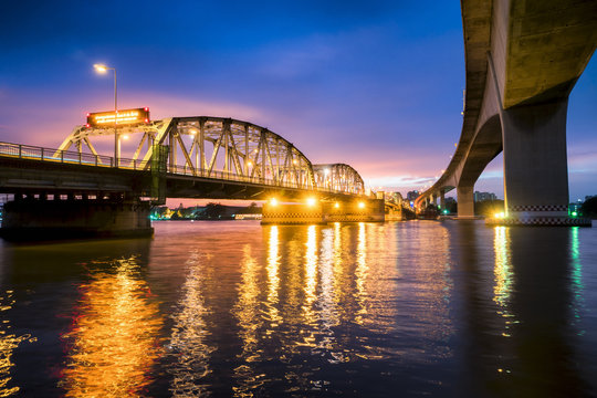 BANGKOK - August 24, 2018 : Krungthep - Rama III Bridge A bridge across the Chao Phraya River Between Ratchadapisek Road and Somdej Taksin Road in sunset ,Thon Buri in Bangkok Thailand.