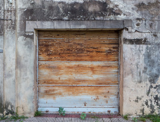 The front of a closed shop in a small town in Argentina.