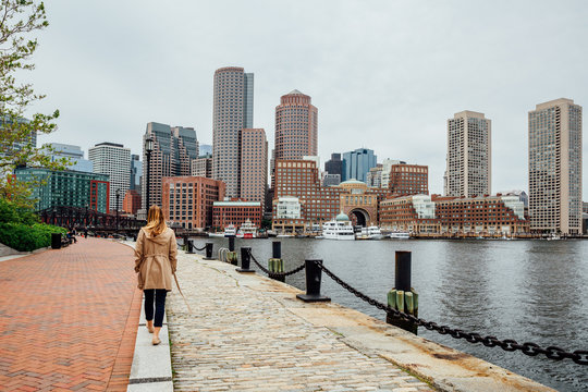 Girl in Harborwalk, Seaport, Boston, Massachusetts, USA.