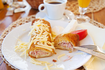 Traditional breakfast; fried pancake filled with cheese and ham