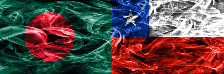 Obraz premium Bangladesh vs Chile smoke flags placed side by side. Thick colored silky smoke flags of Bangladesh and Chile