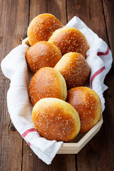 Fresh homemade burger buns with sesame.