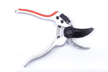 An open pruning scissors isolated