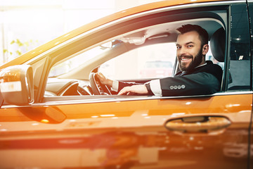 Handsome Man driving his car