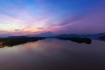 Sunrise view of Mengkabong River and Mount Kinabalu at dawn break.