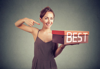 Smiling saleswoman advertising best product - obrazy, fototapety, plakaty
