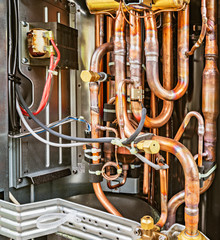 Metal tubes inside the new air conditioning equipment.
