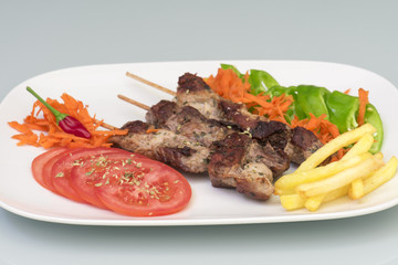 Pinchitos de cerdo con vegetales