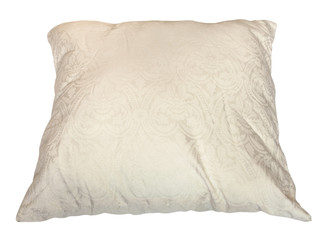 used creamy colour pillow isolated on white