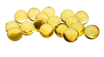 many capsules with oil close up isolated
