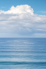 Naklejka na ściany i meble Aerial. Outdoor ocean white clouds poetic image.