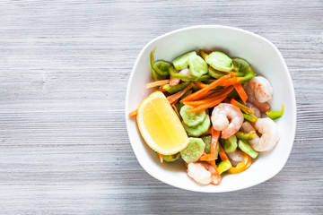prawn salad from fresh vegetables and shrimps