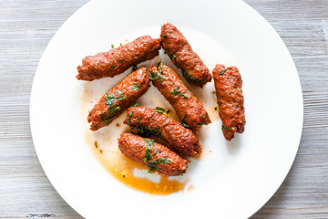 Mutton Seekh Kabab on white plate