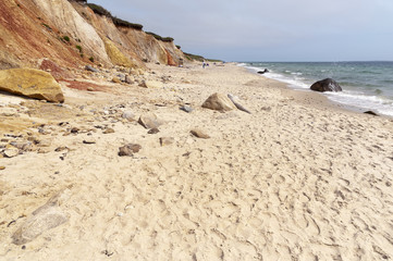 Fototapeta na wymiar Footprints on Sandy Moshup Beach with Cliffs On Martha's Vineyard Island