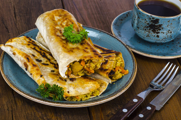 Fast street food. Lavash, shavarma with rice, chicken and vegetables