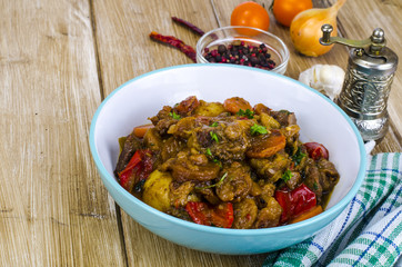 Uzbek cuisine. Fried vegetables with meat