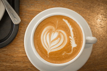 Close up image of a barista made cup of coffee
