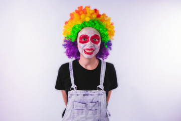 girl in a bright image of a clown. emotional portrait of a student. costumed presentation of...